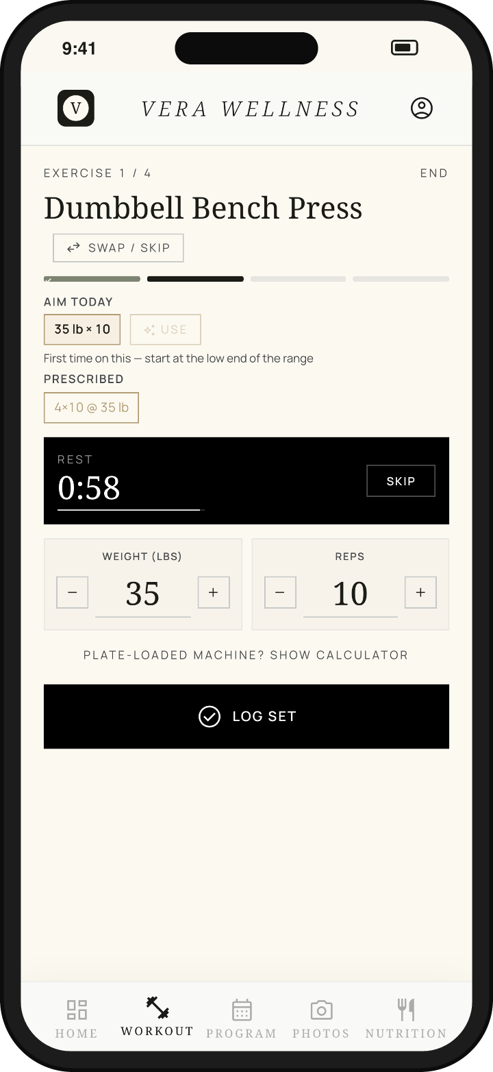 Phone: mid-workout player with rest timer running and AI-suggested load